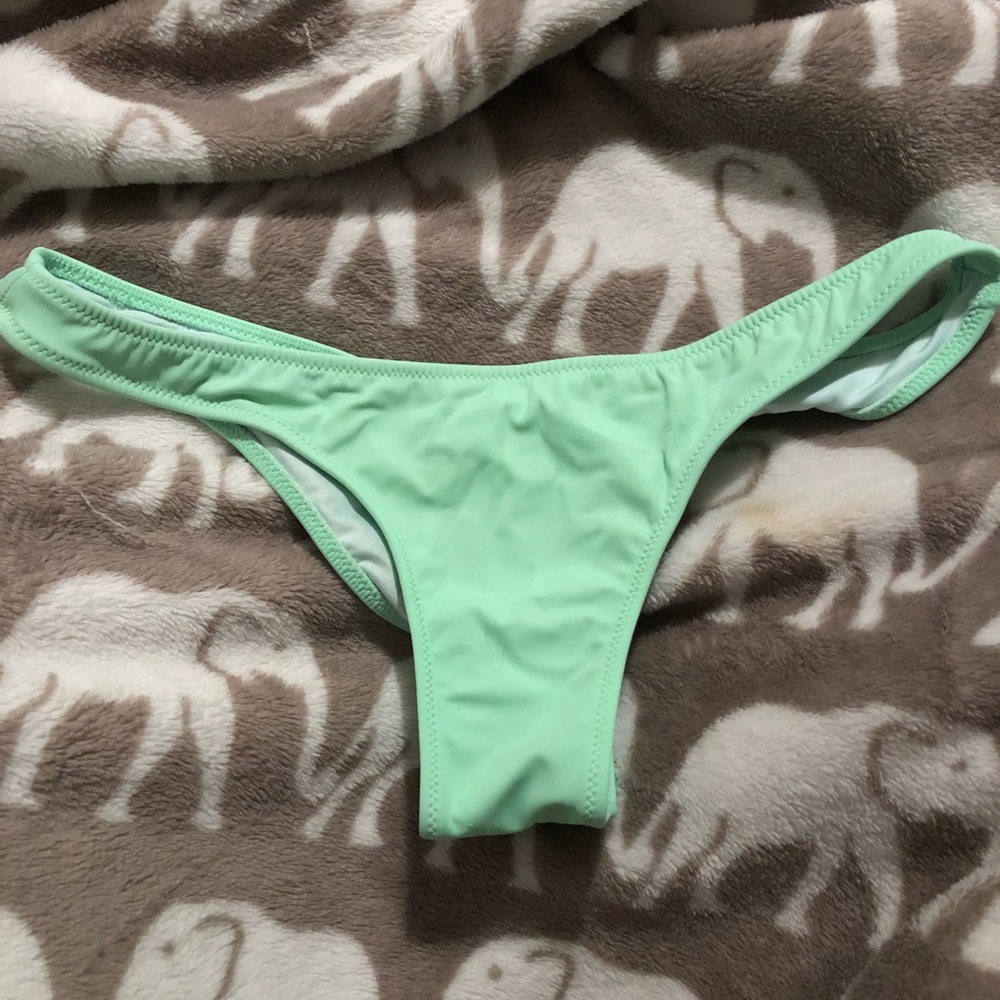 Victoria’s Secret lime green bathing suit bottoms